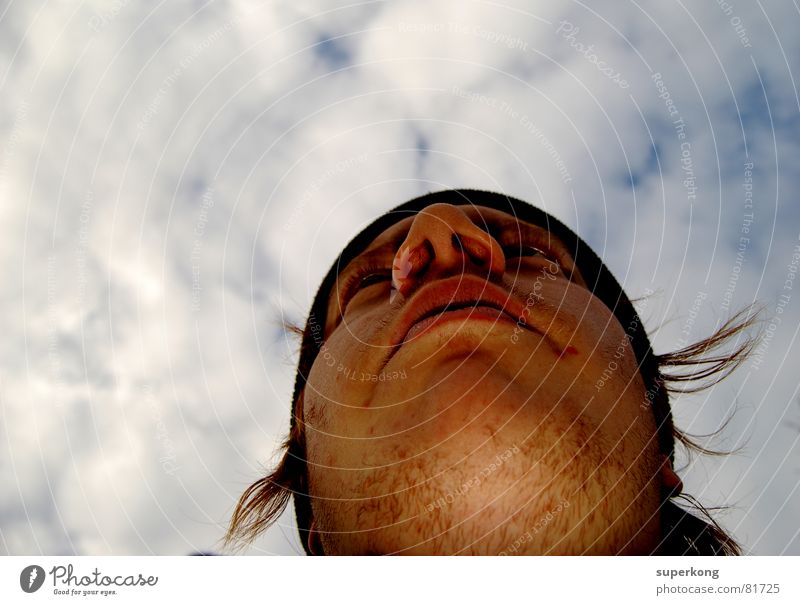 021 Man Portrait photograph Clouds Human being Sky Face Wind Nose Mouth Eyes Looking Perspective Concentrate Direction Unshaven Worm's-eye view Face of a man