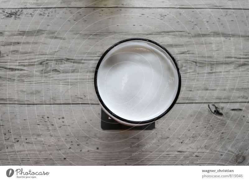 Beer glass on wooden table Beverage Cold drink Authentic Cool (slang) Fluid Debauchery Glass Table Wooden table Bright Colour photo Detail Deserted