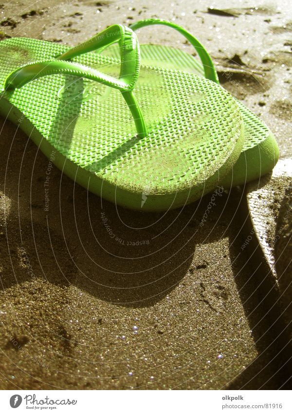 crass green flip flops Flip-flops Summer Beach Ocean Vacation & Travel Green Sandal Footwear Sun Serene Calm Relaxation Shuffle Bathing place Beige Sunbathing