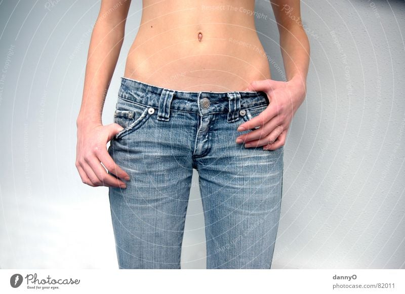 Finger sticking out of blue jeans fly open - a Royalty Free Stock Photo  from Photocase