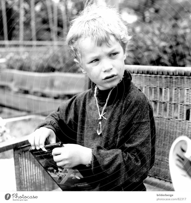 observantly Rock crystal Retreat Child Gift Pensive Watchfulness Grasp Dreamily Portrait photograph Gray Black Boy (child) Skeptical Testing & Control Hippie
