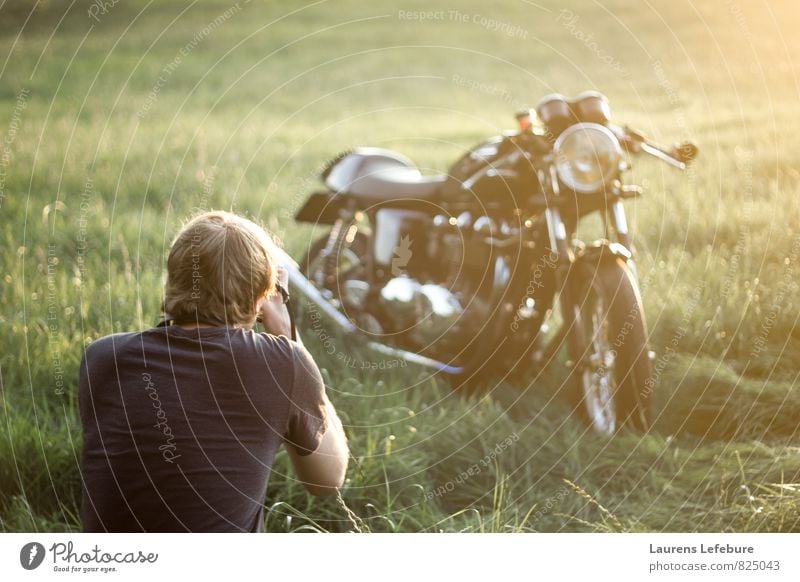 Young man observing Triumph thruxton motorcycle in the field. Lifestyle Elegant Style Work of art Youth culture Subculture Motorcycle Esthetic Cool (slang)