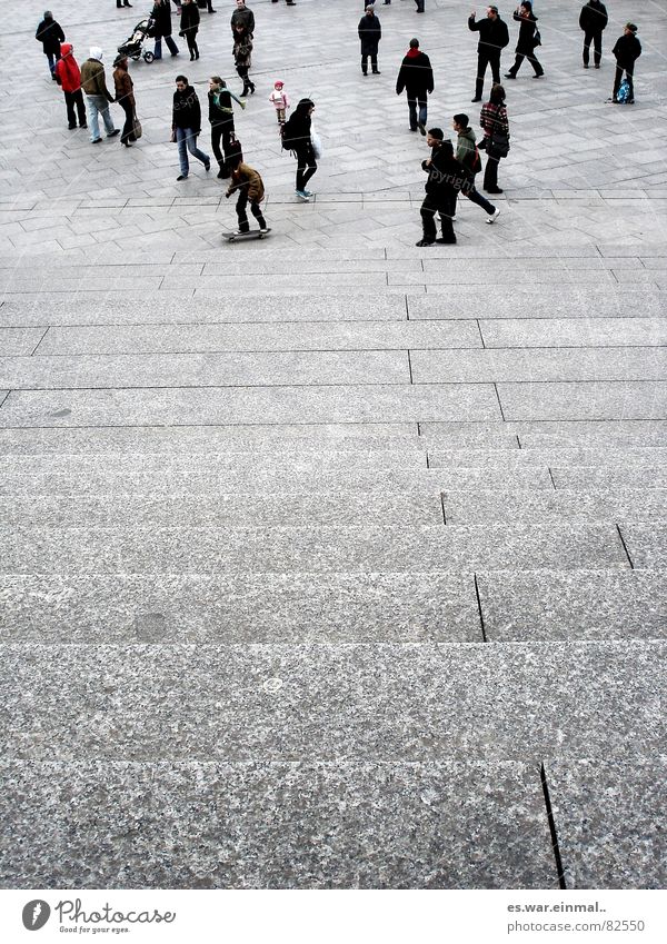 Mama? Human being Young woman Youth (Young adults) Young man Woman Adults Man Couple Legs Autumn Winter Town Pedestrian Street Stone Movement Going Walking