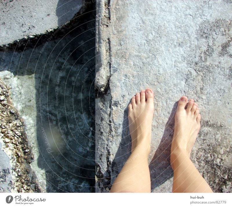 legroom Toes Nail Wall (barrier) Concrete Consumed Ocean Pattern Going Dirty Stone Minerals Above stupid Legs Feet Water Line Lanes & trails Walking Wait