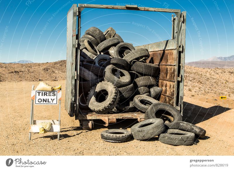 Old truck tires. Industry Environment Means of transport broken dump dumpster recycle rubber Tire Trash used worn Colour photo Exterior shot Deserted