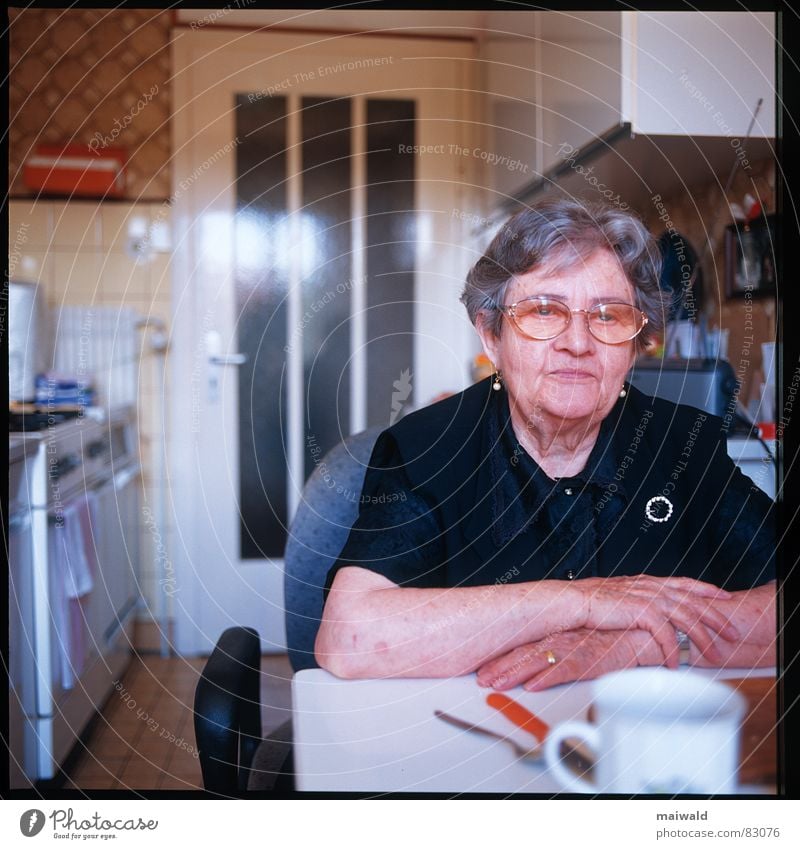widow Widow Grandmother Woman Loneliness Grief Kitchen Brunch Think Gray-haired Table Cup Depth of field Eyeglasses Boredom Hand Senior citizen Mug
