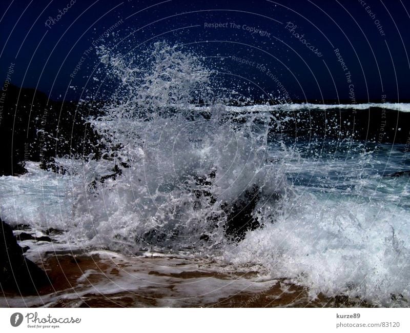 Perfect wave Waves Beach Ocean Vacation & Travel Surf Gale Drops of water Sea water Summer Sandy beach Wet Sardinia Water Blue Stone Wind Salt Sky Rock