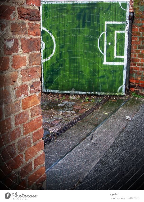 Goal, goal, soccer goal! Goalkeeper Excessive zeal Green Highway ramp (entrance) Entrance Way out Brick Wall (building) Real estate Wood Wooden gate