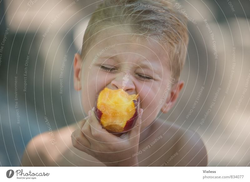 Vitamins :-) Child Brother Infancy Youth (Young adults) Head 8 - 13 years Eating Healthy Delicious Juicy Peach more gourmet Portrait photograph Closed eyes