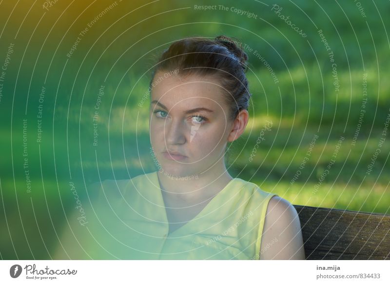 young dark haired woman sits in nature Human being Feminine Young woman Youth (Young adults) 1 18 - 30 years Adults 30 - 45 years Environment Nature Spring