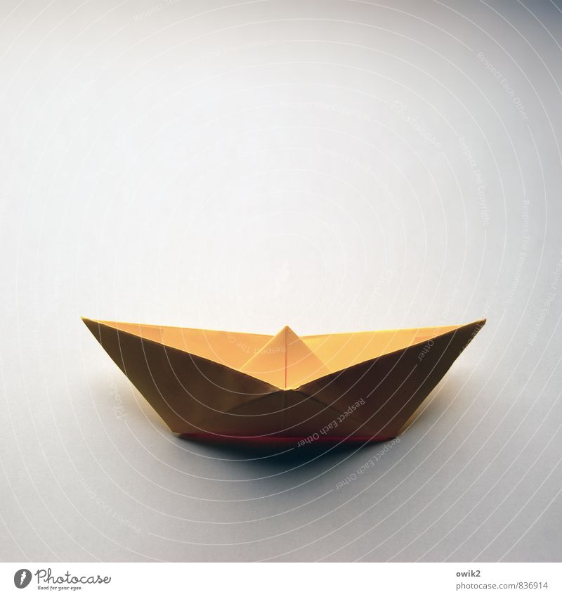 Sailing for beginners Work of art Paper Paper boat Folded Transport Means of transport Navigation Sharp-edged Simple Near Maritime Yellow 1 Uniqueness