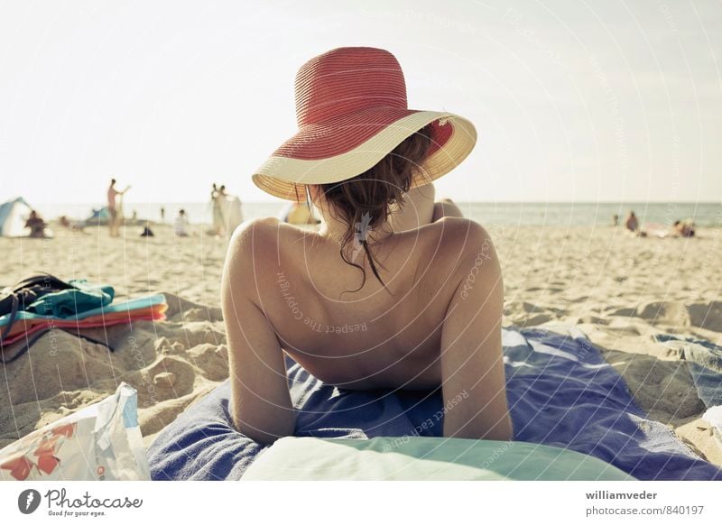Girl with hat from behind on the beach Wellness Harmonious Well-being Contentment Vacation & Travel Tourism Trip Summer Summer vacation Sun Sunbathing Beach