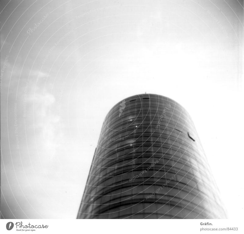 Glass tower Building Holga Black Round Window House (Residential Structure) Manmade structures Lomography Modern Tower Sky Black & white photo Construction site