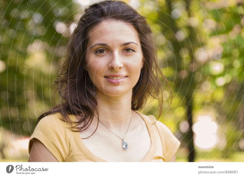 Portrait of a beautiful young woman at park Lifestyle Beautiful Face Relaxation Summer Woman Adults Youth (Young adults) 1 Human being 18 - 30 years Nature Park