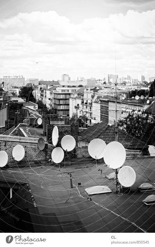 Above the roofs of Berlin Cable Satellite dish Environment Sky Clouds Town Capital city House (Residential Structure) Roof Hot Air Balloon Gloomy Chaos