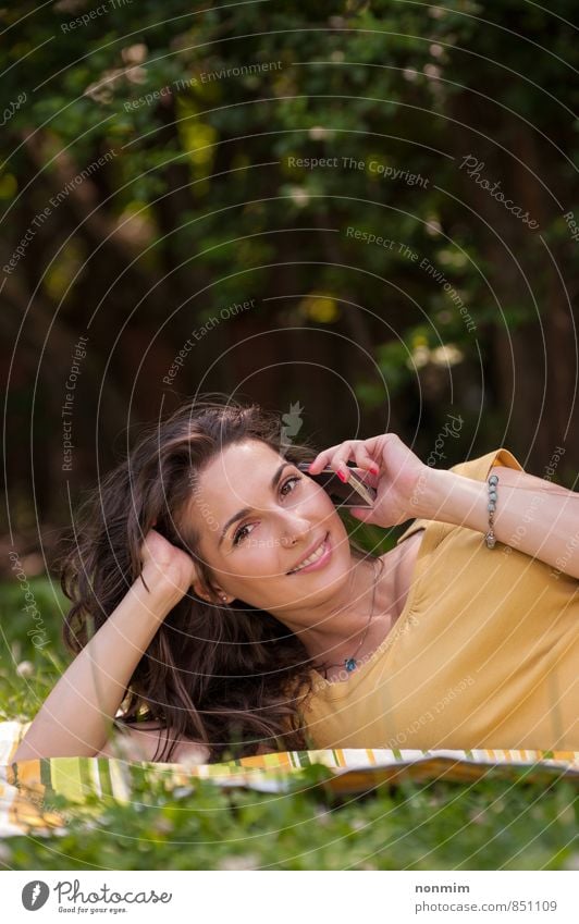Portrait of a beautiful young woman talking on phone Lifestyle Beautiful Relaxation Telecommunications To talk Telephone Cellphone Woman Adults