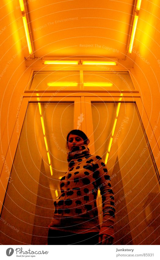Pose in SCI-FI Rio de Janeiro Light Yellow Posture Woman Radiation Style Design Shaft of light Neon light Yolk Clothing casual Floodlight Glass Perspective