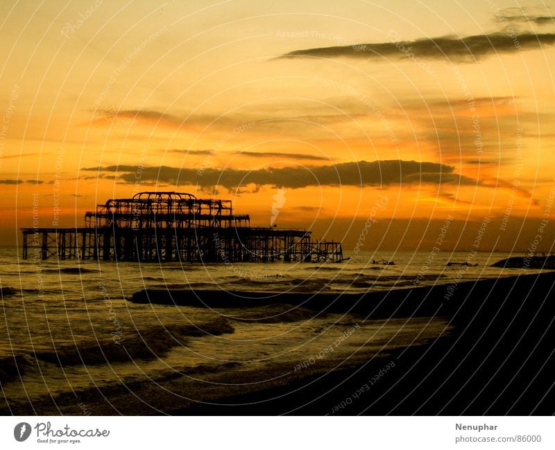 Old Pier I Synthesis Variable Past Ocean Jetty Sunset Waves Cloud formation Dusk Glow Remainder Transience Diminish Ignite Burn Evening Agency Beach Coast