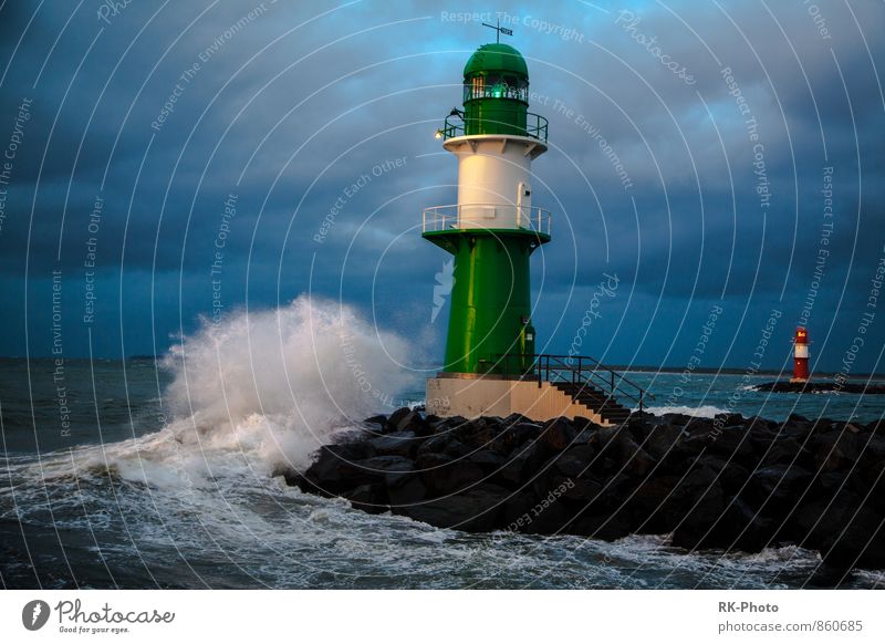 lighthouse Water Drops of water Sky Clouds Storm clouds Horizon Bad weather Wind Gale Thunder and lightning Waves Coast Lakeside Bay Baltic Sea Warnemünde