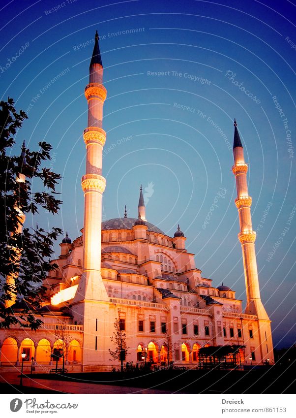 oblique luminous Architecture adana Turkey Asia Town Downtown Park Tower Manmade structures Building Mosque Minaret Tourist Attraction Large Blue Yellow Gold