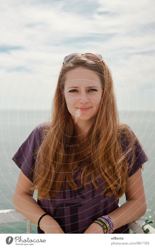 Young woman at the sea Far-off places Cruise Human being Feminine Youth (Young adults) Woman Adults Hair and hairstyles 1 18 - 30 years Sky Clouds Ocean