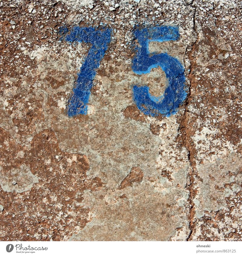 GE Stone Concrete Digits and numbers Blue Town 75 Birthday Old Jubilee Colour photo Exterior shot Pattern Structures and shapes Copy Space bottom