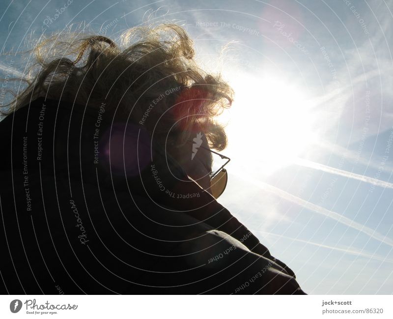 EK incognito Woman Head Sky Beautiful weather Wind Jacket Sunglasses Curl To enjoy Dazzle Frizzy Light heartedness Shock of hair Coaxing Firmament Discern