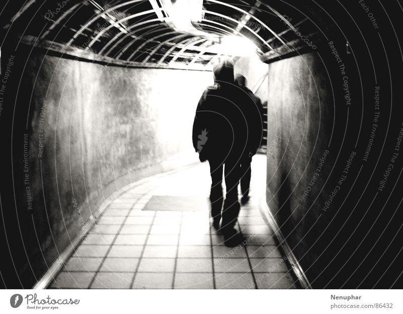 leaving Tunnel Subsoil Downward Dark Entrance Underground Surprise Expectation Pedestrian underpass Pursue Derelict Black & white photo at the end of the tunnel