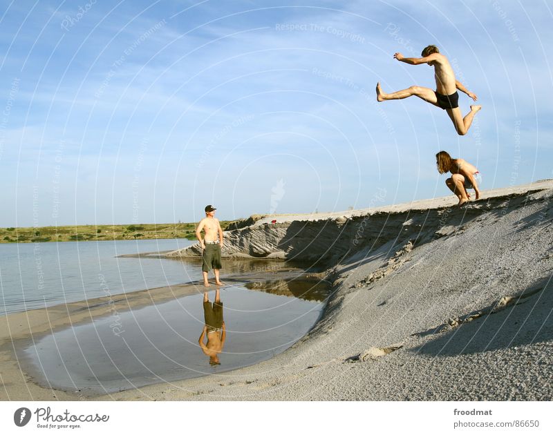 flying duck Jump Puddle Summer Action reflection. open pit mining Flying Desert Water Joy Dynamics Sky Shadow Tall Swimming & Bathing