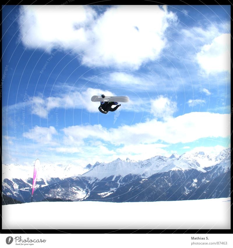900° flip Salto Jump Snowboard Austria Back somersault Clouds Austrian Style Exterior shot Winter sports Leisure and hobbies Freestyle Extreme Air Trick Resort