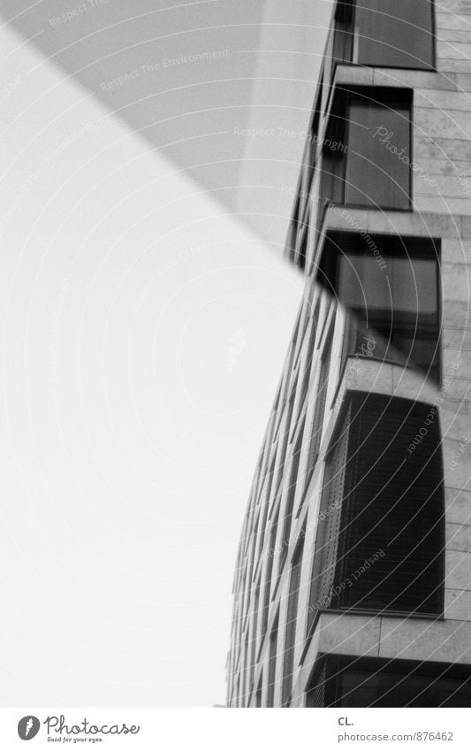 Buckling in the optics Sky Town High-rise Building Architecture Facade Window Glas facade Mirror Sharp-edged Gloomy Black & white photo Exterior shot Deserted