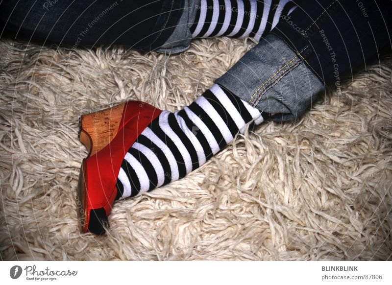 A woman with black and white striped stockings - a Royalty Free