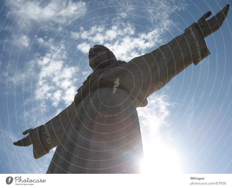 Christo Rei Jesus Christ Statue Monument Clouds Sculpture Landmark House of worship Peace Sky Arm Sun blessing messiah
