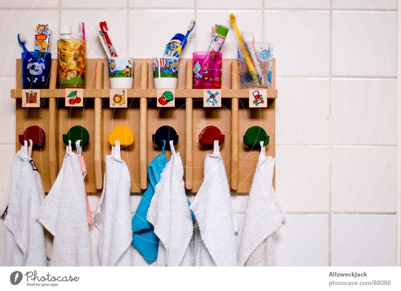 Order is half the life. Towel hook Toothpaste Toothbrush mug Kindergarten Preschool Education preschool education laundry room Tile Arrangement Infancy