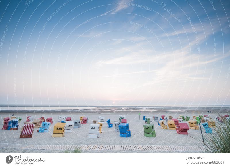 Play of colours on the beach Environment Nature Landscape Water Sky Clouds Sunrise Sunset Summer Moody Contentment Beach chair Footbridge Mud flats