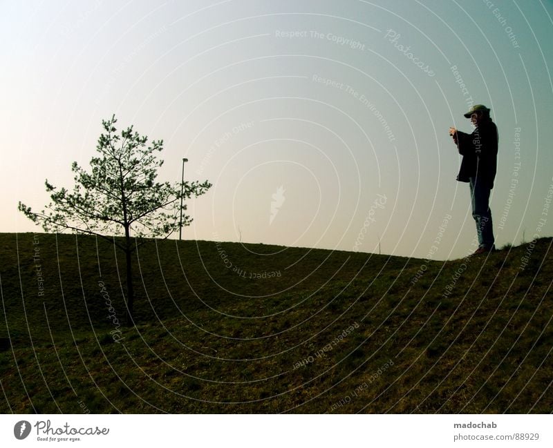 PICTURE IN PICTURE Multicoloured Man Sit Style Adaptive Meadow Grass Green Park Summer Break Gentleman Human being Life Relaxation Vacation & Travel To enjoy