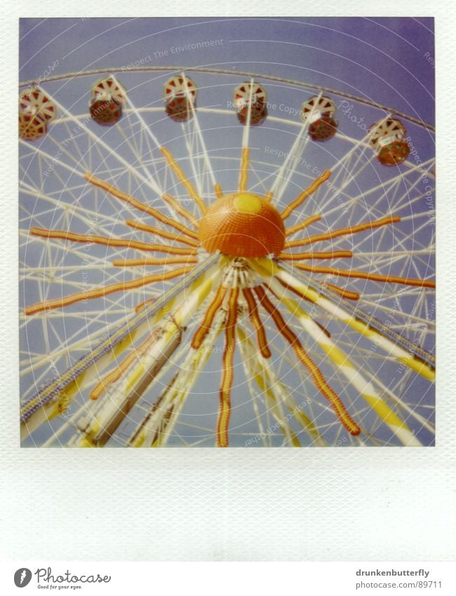 skyrocketing Ferris wheel Fairs & Carnivals Rotate Circle Summer Yellow Leisure and hobbies Sky Blue Joy Polaroid Orange Tall