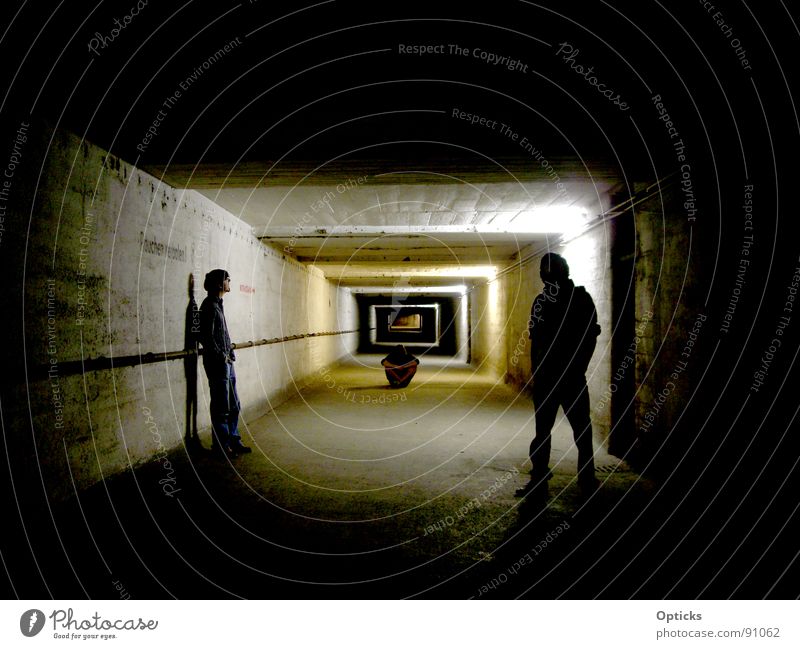 tunnel vision Tunnel Dark Light Think Cellar Emergency exit Man Shadow Human being Far-off places Corridor
