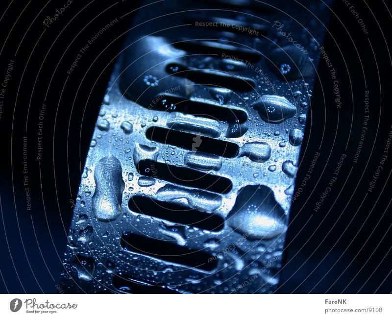 clamp Macro (Extreme close-up) Close-up Drops of water Metal Blue Clamping piece Detail Section of image Partially visible Isolated Image Dark background