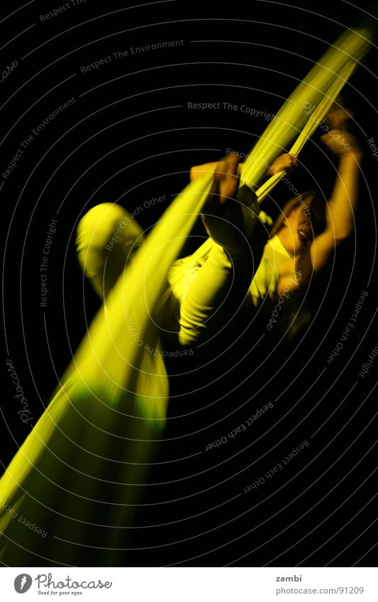 RopeDance Acrobat Yellow Woman Flexible Exciting Articulated Circus Shows Event Sensation Events Interior shot Night shot Long exposure Dark background