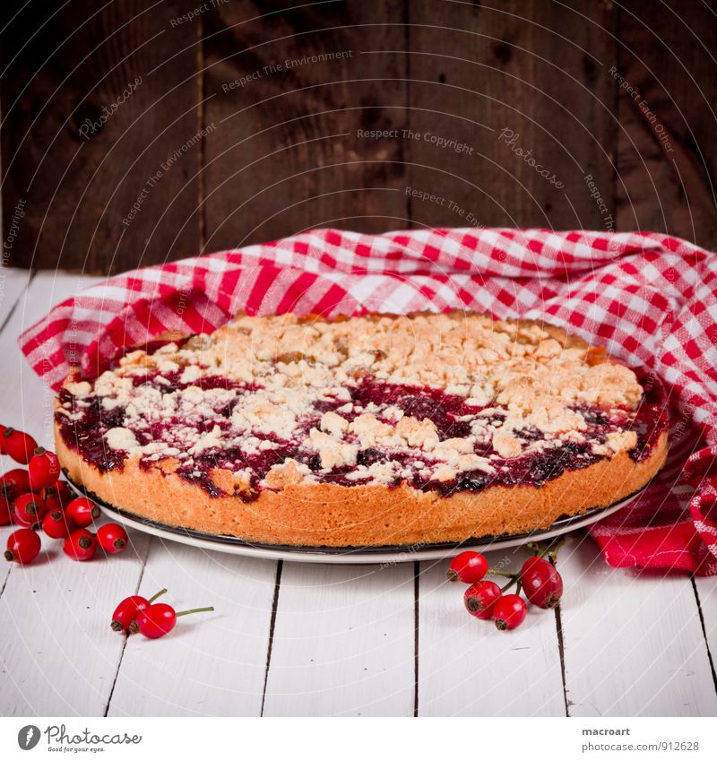 plum cake streusel cake Cake Fruit Fruit flan Country house Dog rose Rose hip Tablecloth Dish towel Wooden table Brown Old Retro Eating Food photograph Sugar