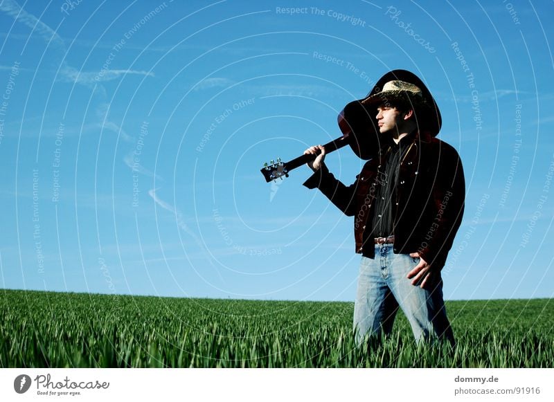 YEEHAA II Cowboy Fellow Man Grass Summer Spring Livestock Herdsman Jacket Buckskin Shirt Cowboy hat Straw Straw hat Playing Music Sound Acoustic Buttons Hand