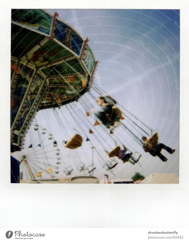 fly through the air Rotate Circle Fairs & Carnivals Giddy Multicoloured Gray Polaroid Sky Human being Blue Chairoplane Detail Section of image Partially visible