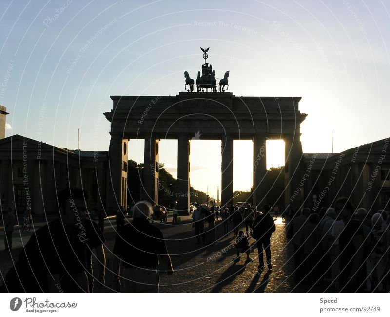Shadow play in Berlin Brandenburg Gate Visual spectacle Dark Crowd of people Tree Clouds Dream Europe Beautiful Squad Exterior shot Modern Architecture Sun