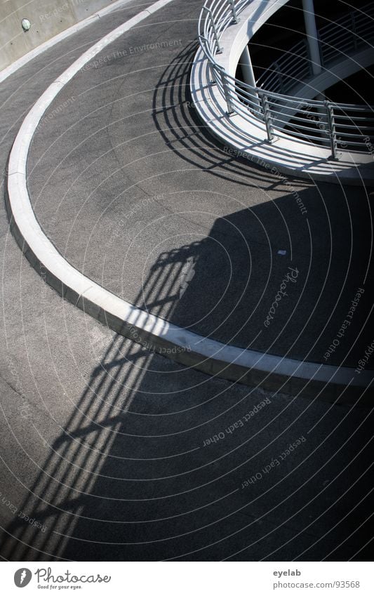 Get in the picture and get out right away Tar Concrete Wall (building) Steel Gray Stripe Traffic lane Lane markings Round Transport Underground garage