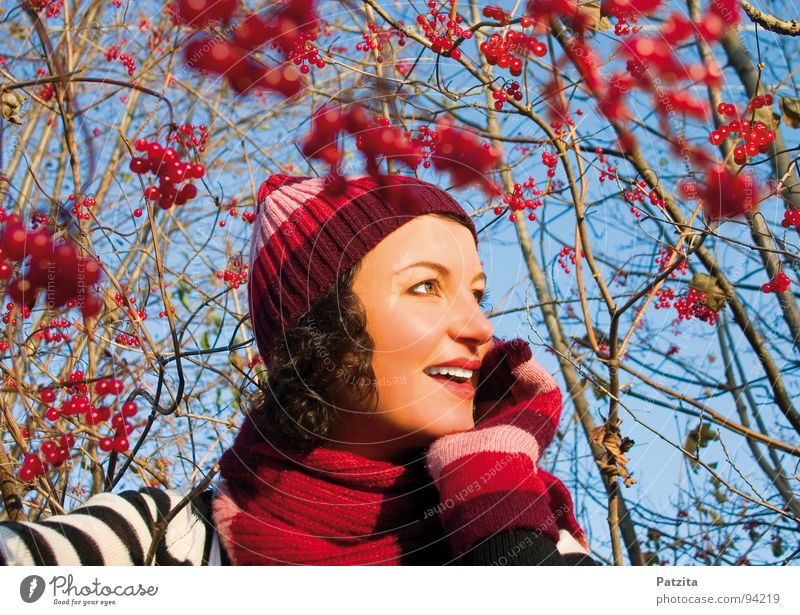 In the Magic Berry Land Woman Cap Scarf Gloves Winter Autumn Forest Red Bushes Beautiful Portrait photograph Strong Meadow Stripe Lips Dream Think Hiking
