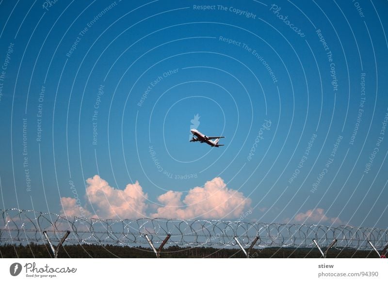 journey Airplane White Passenger plane Nuremberg Intercontinental Covers (Construction) Barbed wire Clouds Exterior shot Airport Aviation Electrical equipment