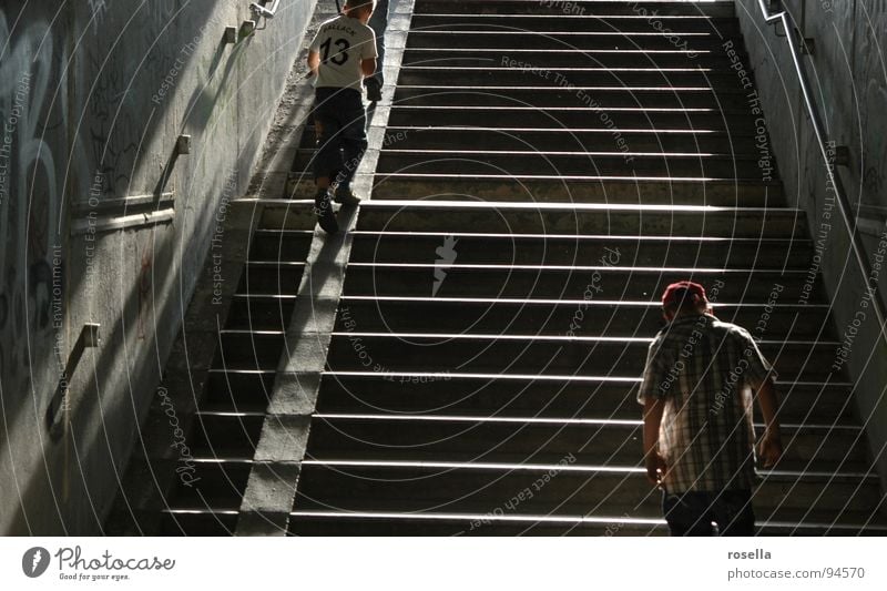 into the light Passage Dark Stadium Tunnel Train station Stairs Shadow Human being Movement