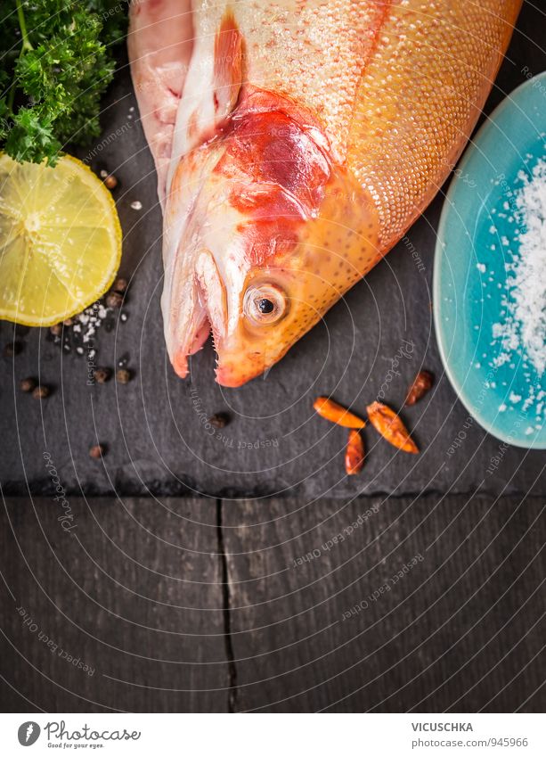 trout on old dark wooden table with lemon and spices Food Fish Vegetable Herbs and spices Nutrition Eating Banquet Organic produce Italian Food Asian Food