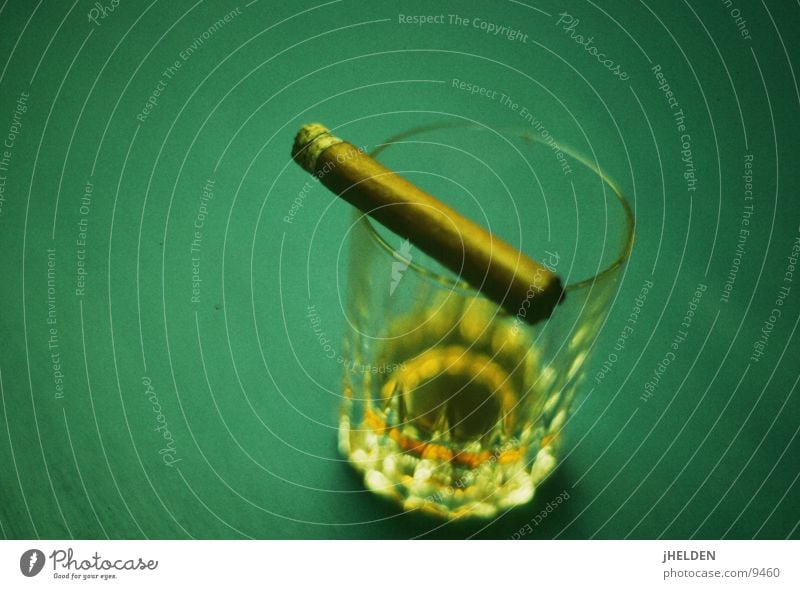 whiskey & cigars Food Beverage Alcoholic drinks Spirits Glass Style Calm Smoke Elegant Delicious Reliability Strong Brown Gold Green Emotions Moody Vice Power
